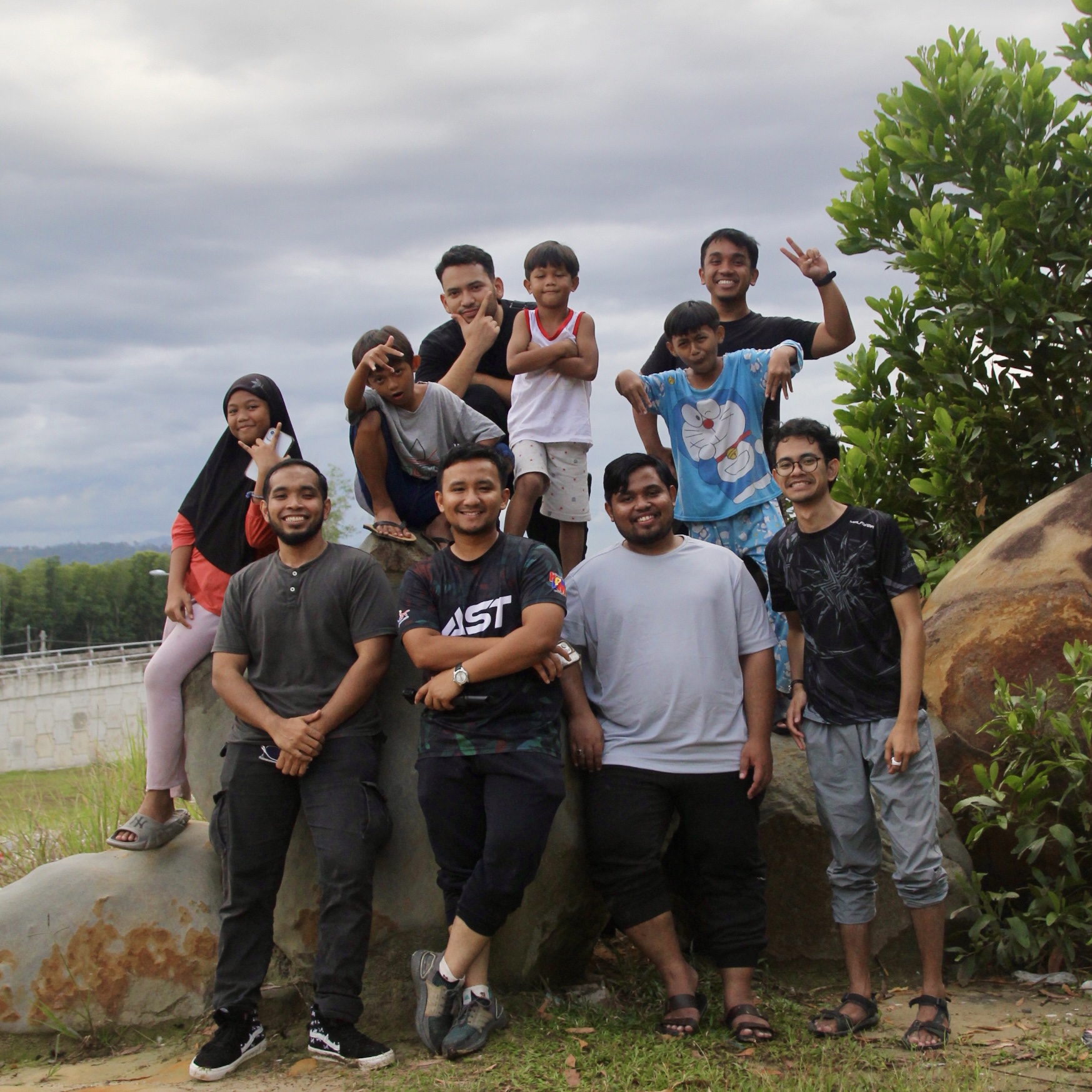 Projek Annur volunteers and children together - showing the joy and community spirit of our volunteer program